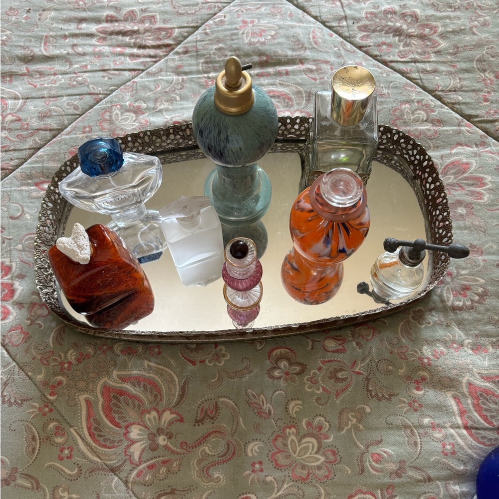 Elegant Gold Vanity Tray with Assorted Perfume Bottles
